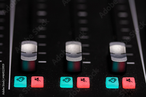 Audio Mixer detail with button and knobs for audio mixing and editing. Workstation for audio and video producer.