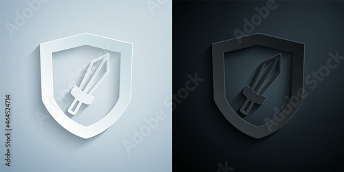 Paper cut Sword for game icon isolated on grey and black background. Paper art style. Vector