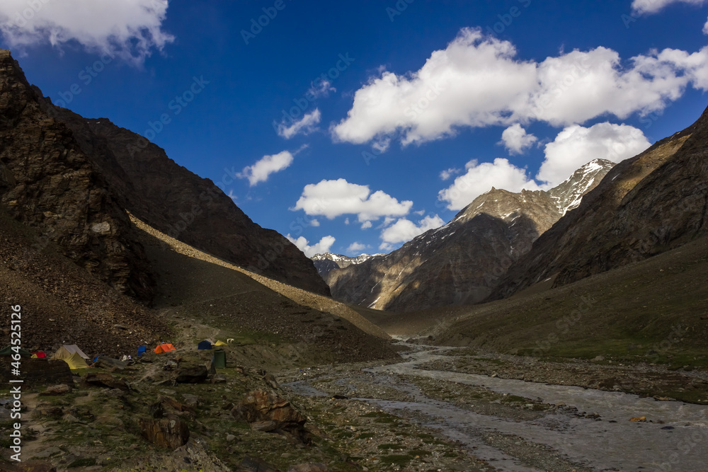 Beautiful Himalayan mountains under a blue sky on the wilderness trek from Manali to Zanskar in Himachal Pradesh, India.