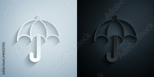 Paper cut Umbrella icon isolated on grey and black background. Insurance concept. Waterproof icon. Protection, safety, security concept. Paper art style. Vector