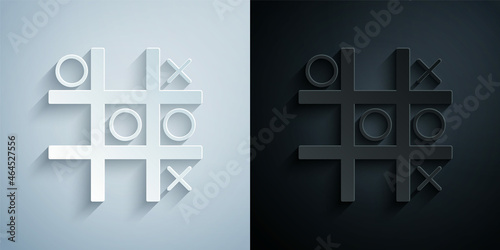Paper cut Tic tac toe game icon isolated on grey and black background. Paper art style. Vector