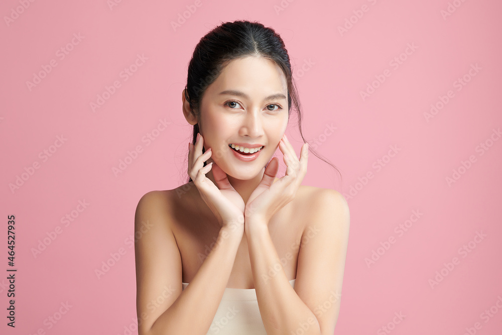 Beautiful young asian woman with clean fresh skin on pink background, Face care, Facial treatment, Cosmetology, beauty and spa, Asian women portrait. Beautiful young asian woman with clean fresh skin on pink background, Face care, Facial treatment, Cosmetology, beauty and spa, Asian women portrait.