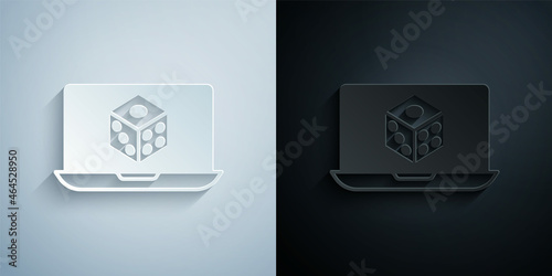 Paper cut Game dice icon isolated on grey and black background. Casino gambling. Paper art style. Vector
