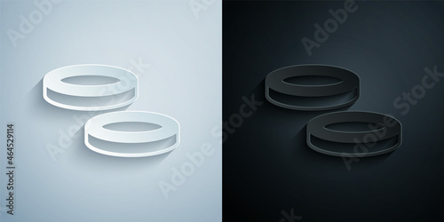 Paper cut Checker game chips icon isolated on grey and black background. Paper art style. Vector