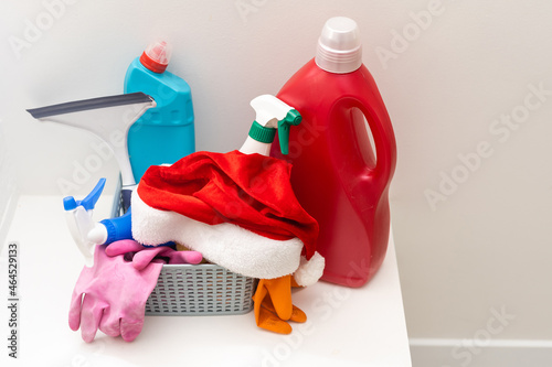 Minimal Christmas background with household chemicals. Plastic. Happy New Year. House and apartment cleaning before Christmas.