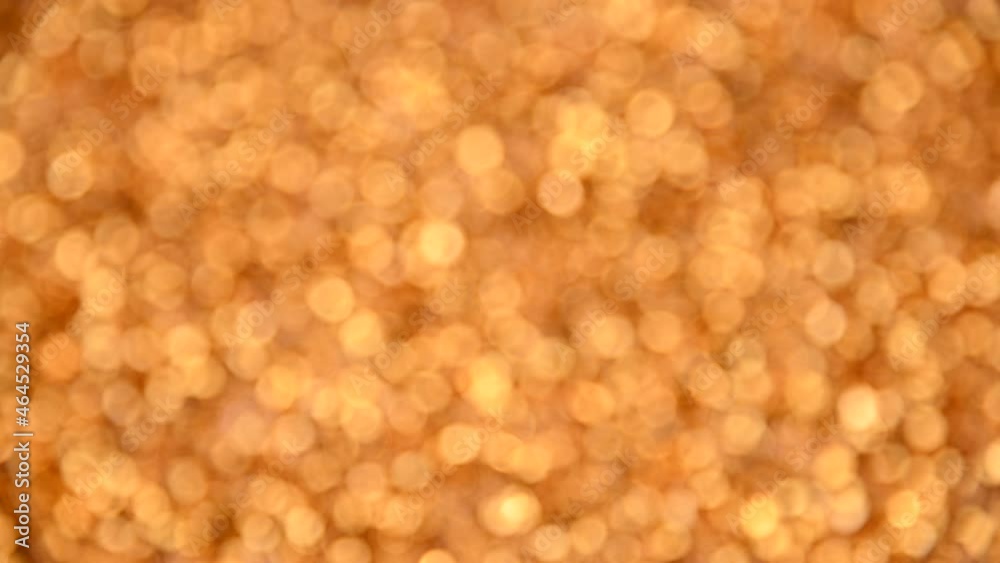 Abstract background of golden bokeh spinning Abstract background of golden bokeh spinning