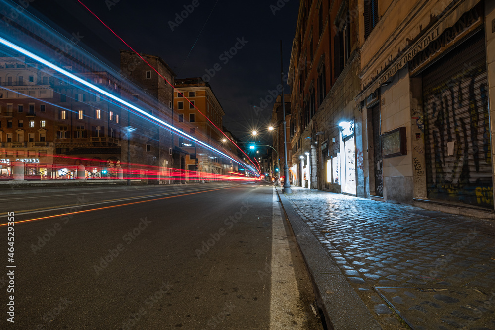 Cool long exposure cars traffic light trails, night view of the city of Rome.