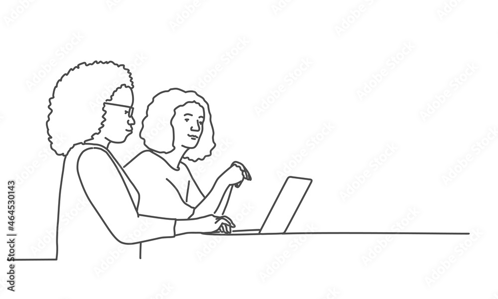 Women work while sitting in their office. Women work while sitting in their office.