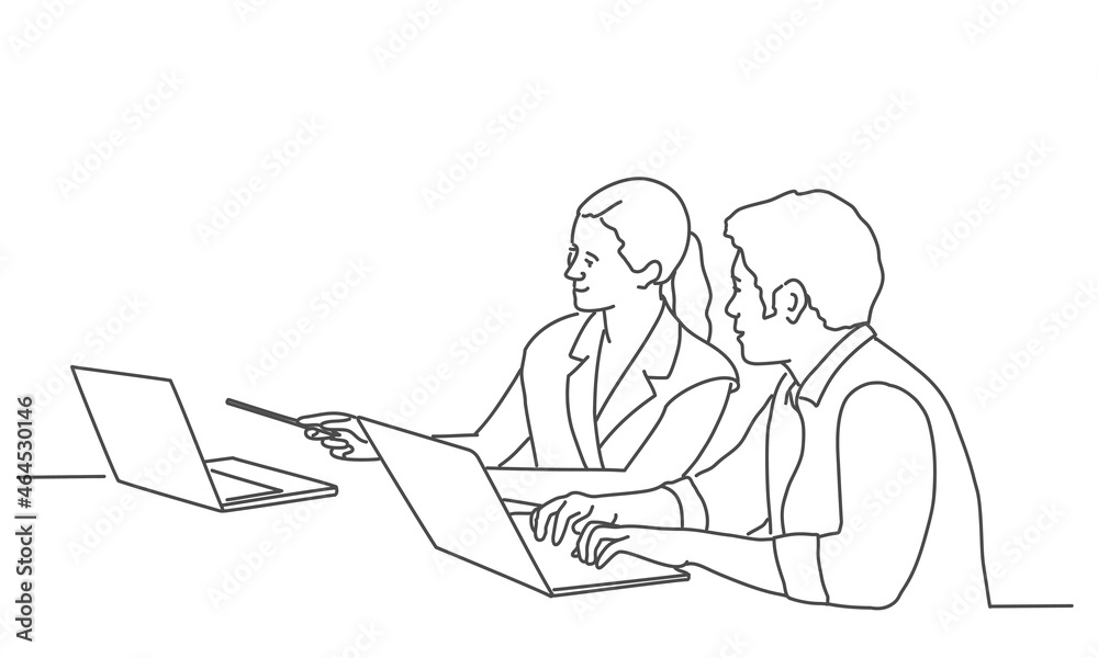 Man writing while sitting in his office. Woman points with pen to laptop. Man writing while sitting in his office. Woman points with pen to laptop.