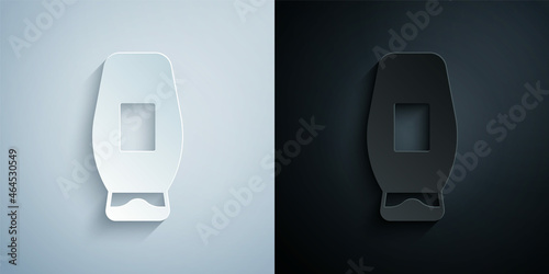 Paper cut Bottle of shampoo icon isolated on grey and black background. Paper art style. Vector