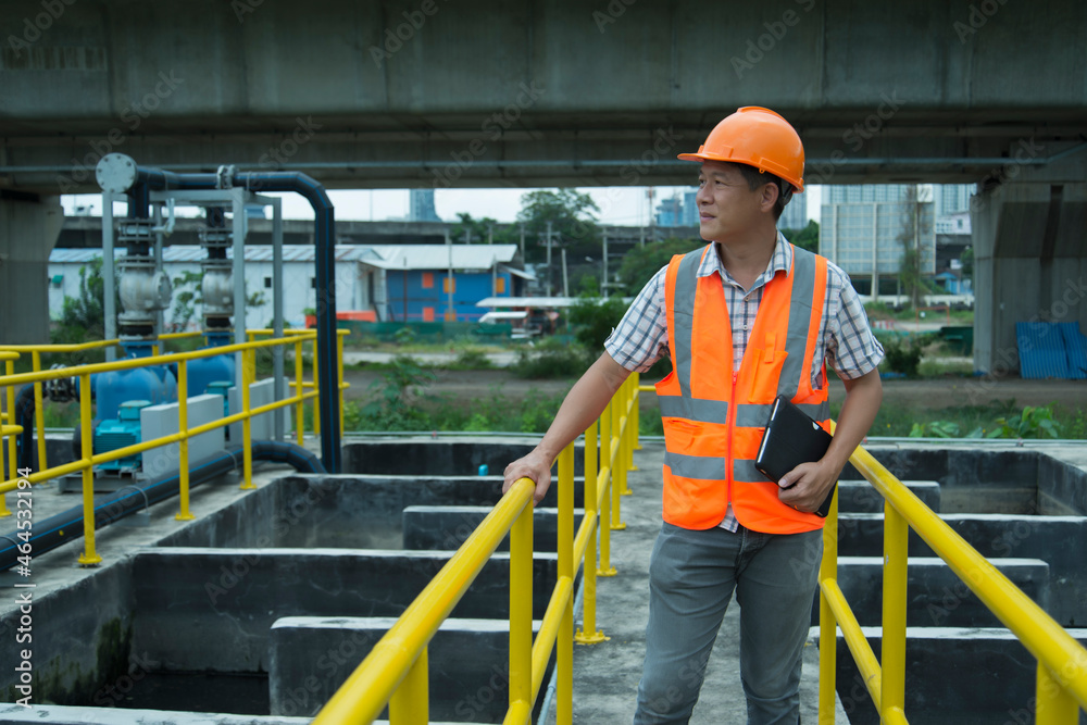 worker at work. workers at work on waste water treatment Plant. worker at work. workers at work on waste water treatment Plant.