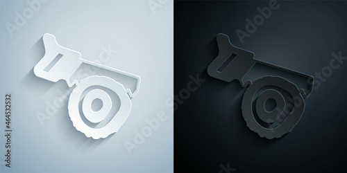 Paper cut Hand saw and log icon isolated on grey and black background. Paper art style. Vector