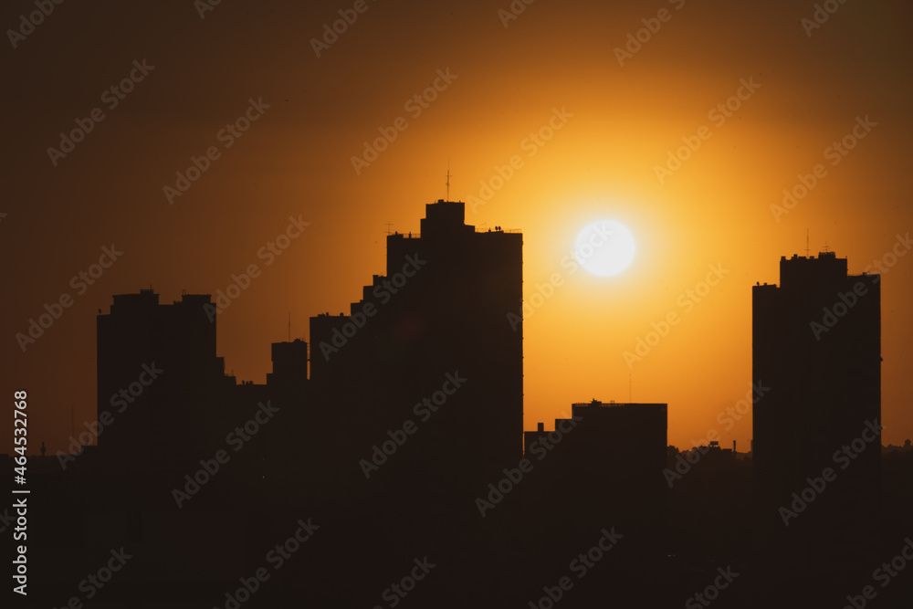sun setting on the city