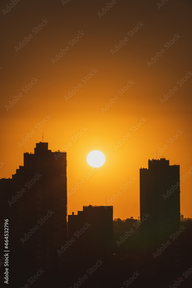 sunset and the silhouette of a  city