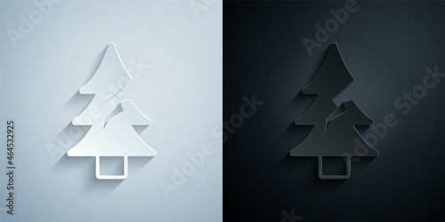 Paper cut Tree icon isolated on grey and black background. Forest symbol. Paper art style. Vector