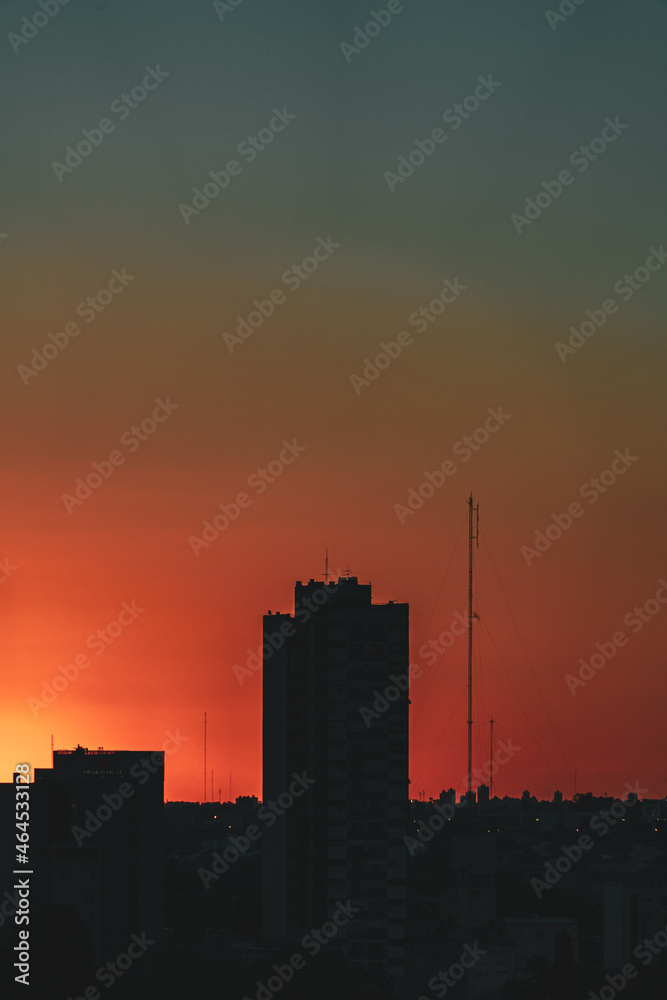silhouette of a building at sunset