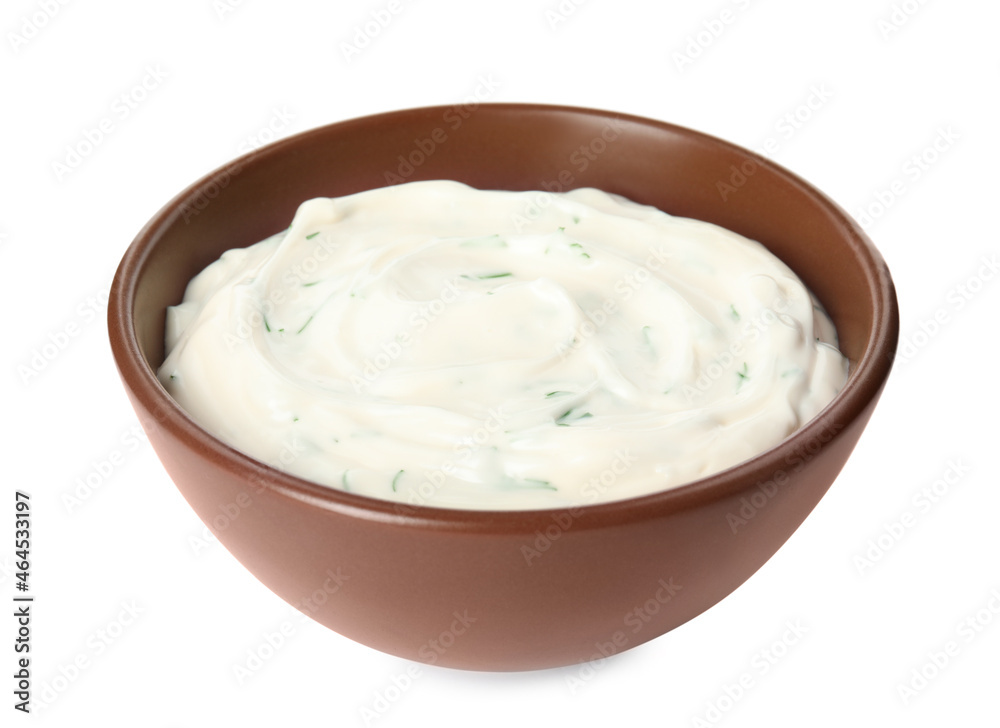 Tasty creamy dill sauce in bowl isolated on white Tasty creamy dill sauce in bowl isolated on white