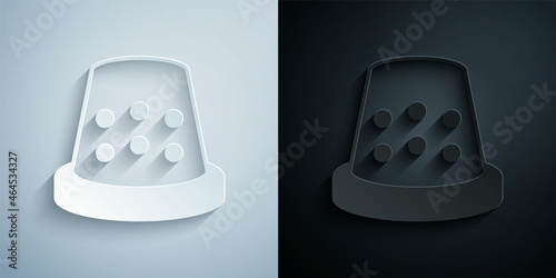 Paper cut Thimble for sewing icon isolated on grey and black background. Paper art style. Vector
