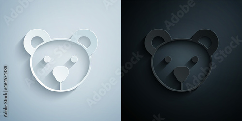 Paper cut Teddy bear plush toy icon isolated on grey and black background. Paper art style. Vector