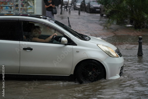 Batumi, Georgia - July 27, 2021: Cars drive in the rain