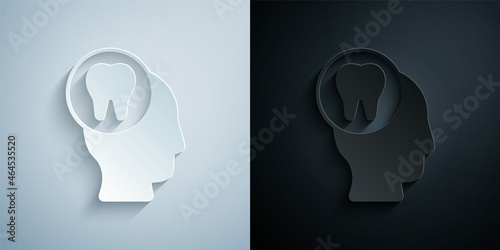 Paper cut Toothache icon isolated on grey and black background. Paper art style. Vector