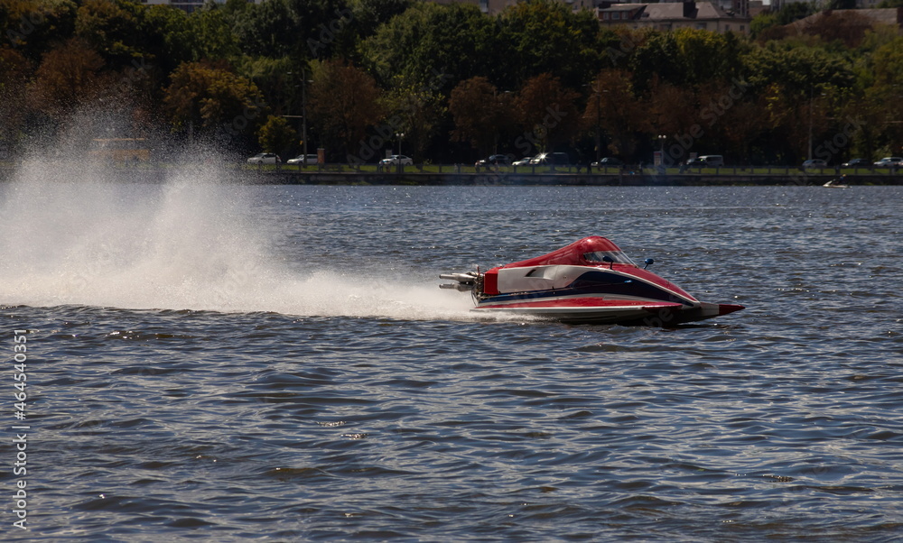 Fototapeta premium sport. motor boat races. speed, water sports. competition on the water on a sunny day