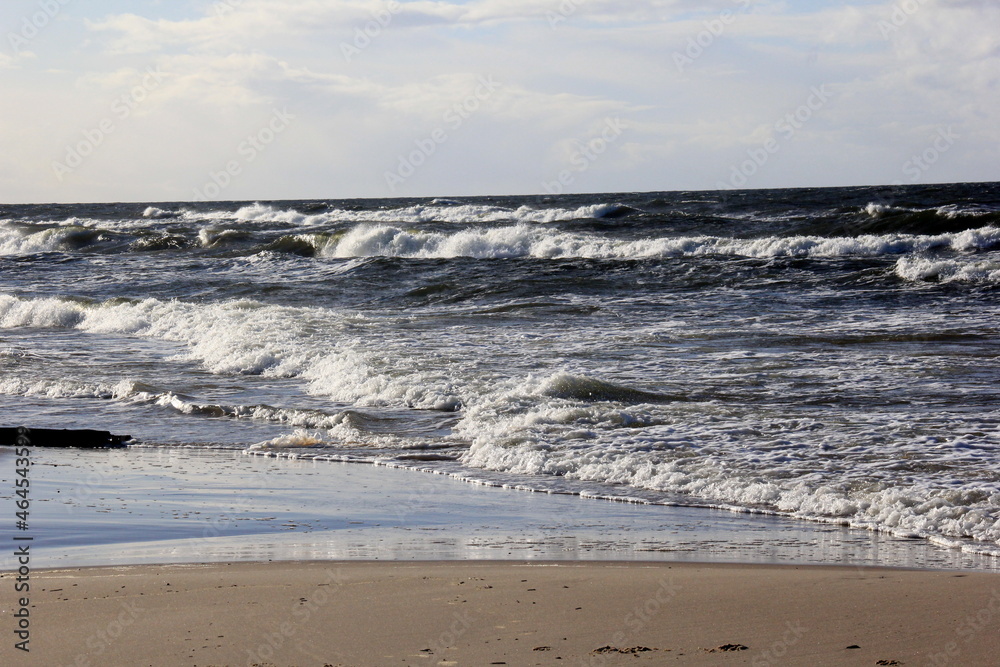 Fototapeta premium Seascape during a storm with large waves, Carnikava, Latvia. Big and powerful sea waves during the storm