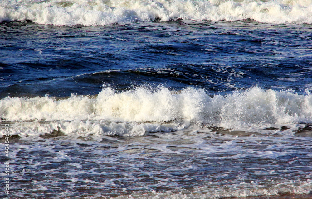 Seascape during a storm with big waves, close-up, Carnikava, Latvia. Big and powerful sea waves during the storm Seascape during a storm with big waves, close-up, Carnikava, Latvia. Big and powerful sea waves during the storm