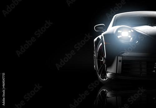 Black generic sport unbranded car isolated on a dark background photo