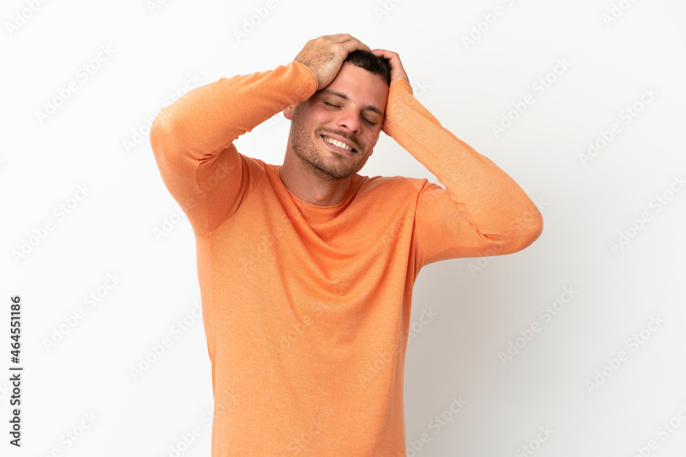 Brazilian man over isolated white background laughing