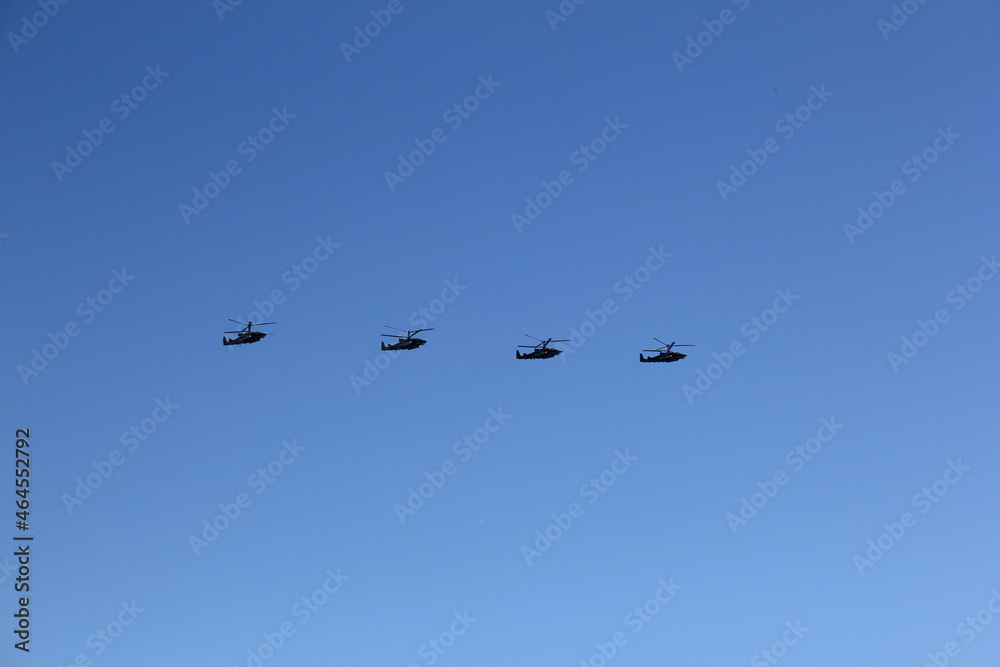Helicopters in the sky