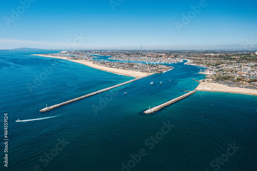 An aerial view of Newport Harbor, Balboa Island, and the Wedge in Newport Beach, California. photo