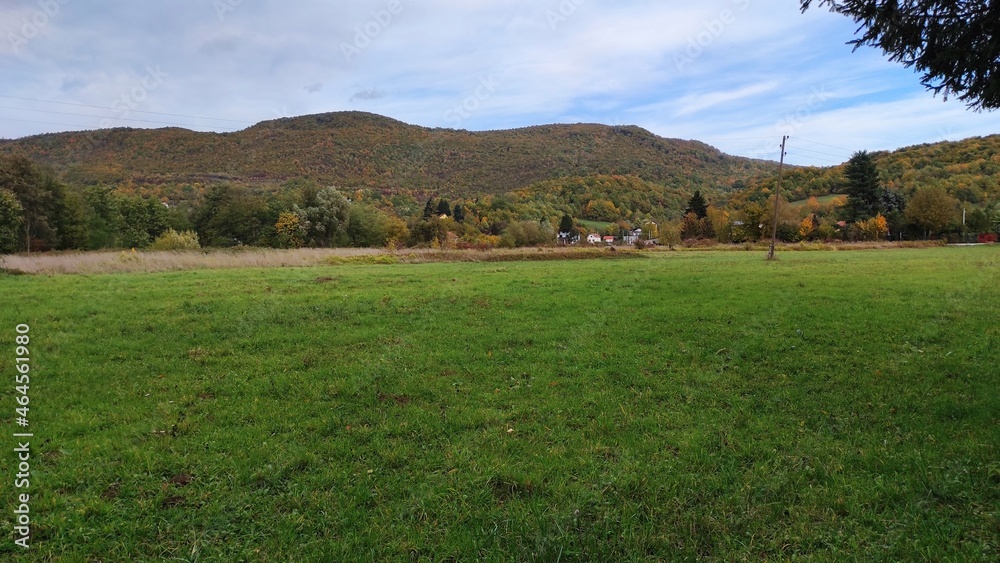 Rural landscape, view of meadow hill and beautiful blue sky above them. Rural landscape, view of meadow hill and beautiful blue sky above them.