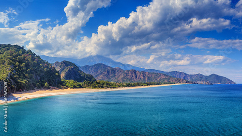 Fototapeta Naklejka Na Ścianę i Meble -  Summer mediterranean coastal landscape - view of the Cirali Olympos Beach, near the Turkish village of Cıralı, Antalya Province in Turkey