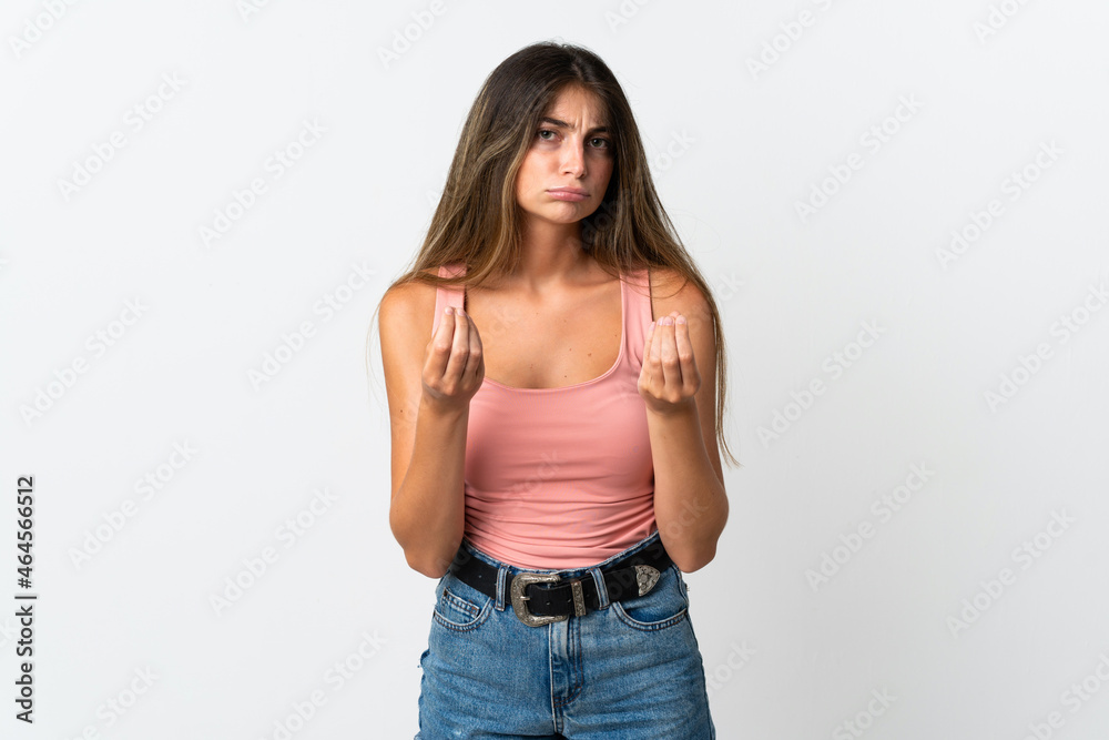 Young caucasian woman isolated on white background making money gesture but is ruined Young caucasian woman isolated on white background making money gesture but is ruined