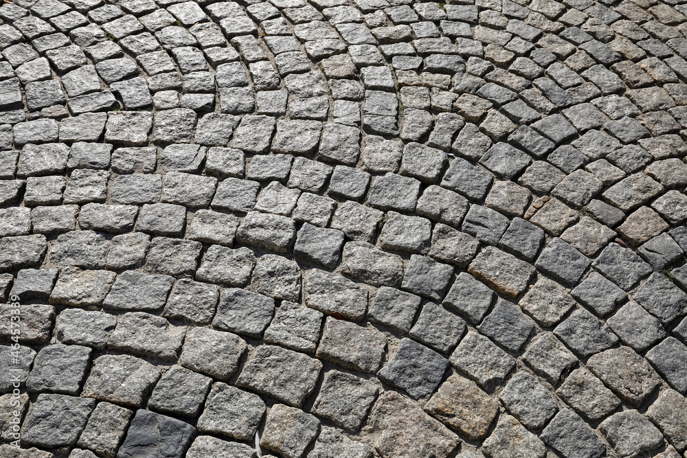 Cobbled stone road surface