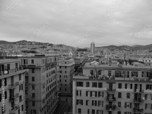 Milan, Italy - October 10, 2021: An amazing caption of Milano's old and modern architecture in black and white. Beautiful view to the details of the skylines from the street.