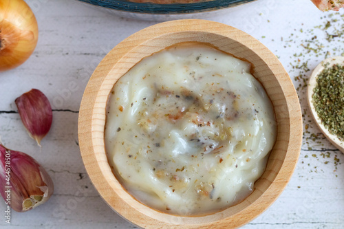 Goose lard in a wooden bowl photo