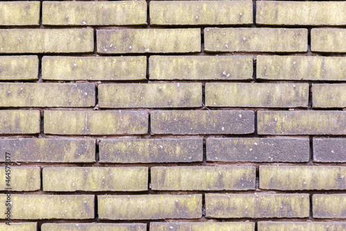 material texture of beige yellow brick wall