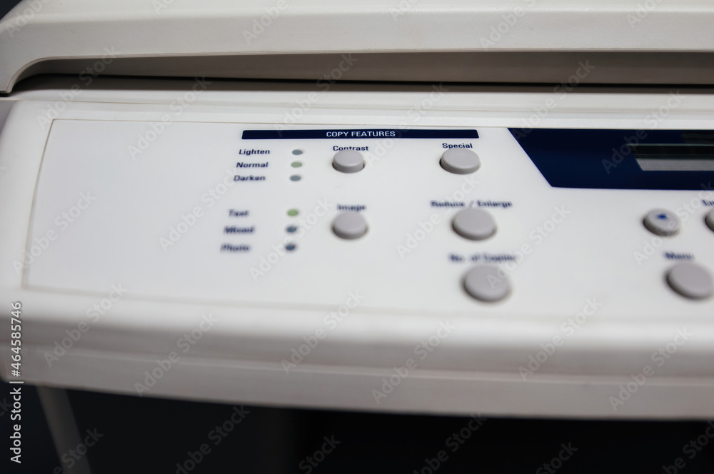 Close-up of fax buttons keypad for dialing modern - vintage copy scanner fax machine with focus on the Copy Features buttons set Contrast, Special, Lighten, Normal Darken Close-up of fax buttons keypad for dialing modern - vintage copy scanner fax machine with focus on the Copy Features buttons set Contrast, Special, Lighten, Normal Darken