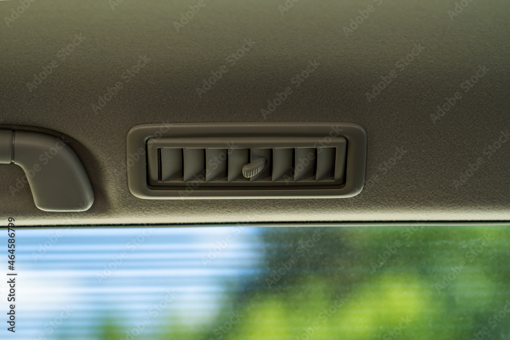 Car air conditioning close up view. The air conditioner flow inside the car. Detail interior of car. Air ducts. Car air conditioning close up view. The air conditioner flow inside the car. Detail interior of car. Air ducts.