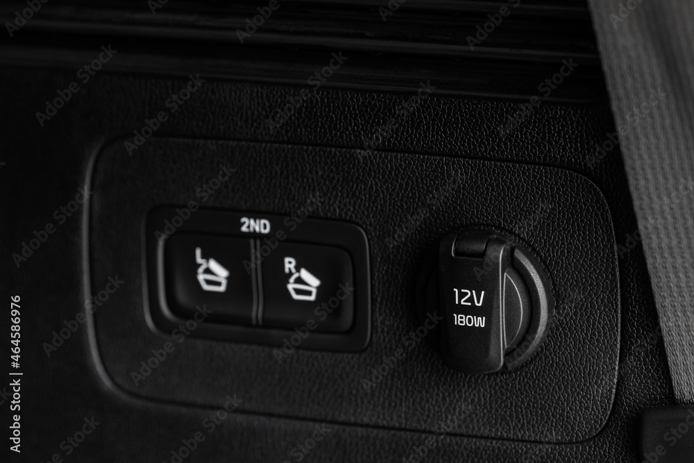 12V power socket in a car. Outlet socket in a car. 12V power socket in a car. Outlet socket in a car.