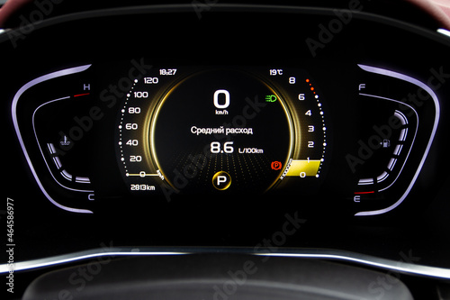 Modern light car black and blue mileage. Car dashboard with sensors and information. RPM, Fuel indicator and temperature.