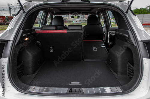Obraz na plátně Huge, clean and empty car trunk in interior of compact suv