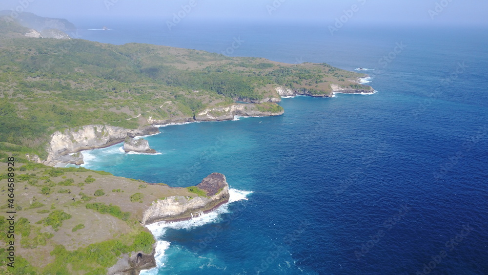 drone view coast beach sea ocean waves nature island Nusa Penida Bali Indonesia summer travel explore blue drone view coast beach sea ocean waves nature island Nusa Penida Bali Indonesia summer travel explore blue