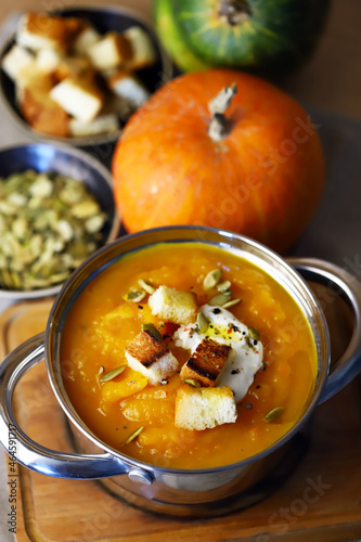 Autumn pumpkin soup in a saucepan.