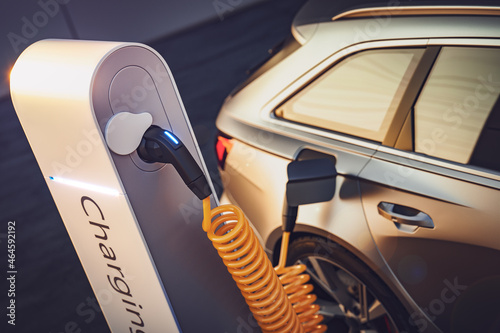 3D Rendering von sparsamen Elektroauto oder Elektrofahrzeug an Ladesäule einer Stromtankstelle lädt Batterie mit Kabel oder ladekabel für ökologische Reichweite und nutzt nachhaltige Energie photo