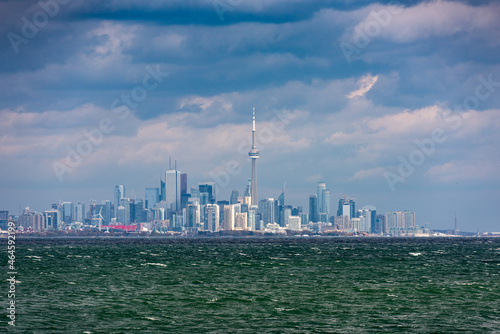 Toronto downtown city line  view from Lake Ontario on stormy weather with cloudy sky  no logos
