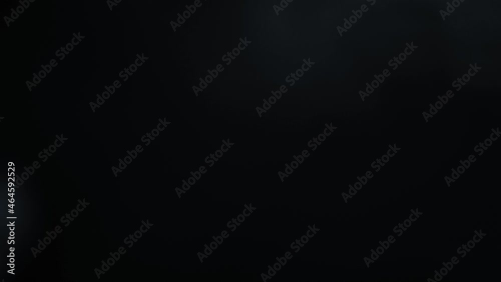 Abstract white smoke in slow motion. Smoke, Cloud of cold fog in light spot background. Light, white, fog, cloud, black background, 4k, ice smoke cloud. Floating fog. Abstract white smoke in slow motion. Smoke, Cloud of cold fog in light spot background. Light, white, fog, cloud, black background, 4k, ice smoke cloud. Floating fog.