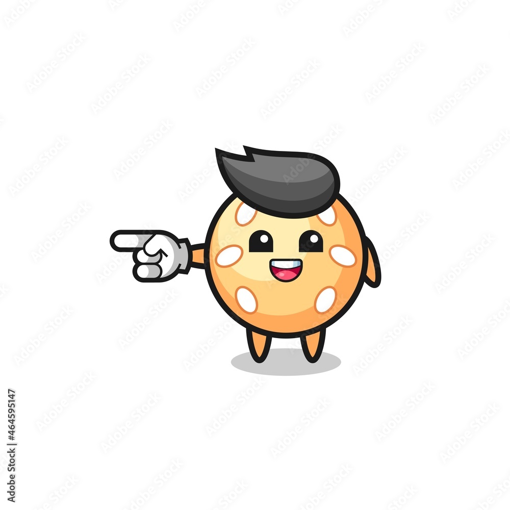 sesame ball cartoon with pointing left gesture